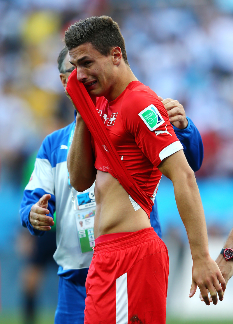 Illustration for article titled Sweaty and Sweet: The World Cup's Most Tender Man-Hugs